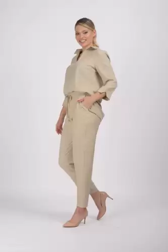 Bluza asimetrica bej din vascoza