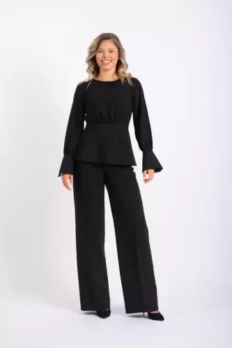 Compleu negru elegant format din pantaloni clopot si bluza cu volan la talie
