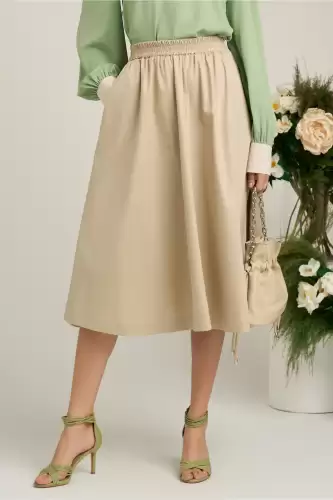 Fusta midi din bumbac bej cu elastic in talie si buzunare functionale