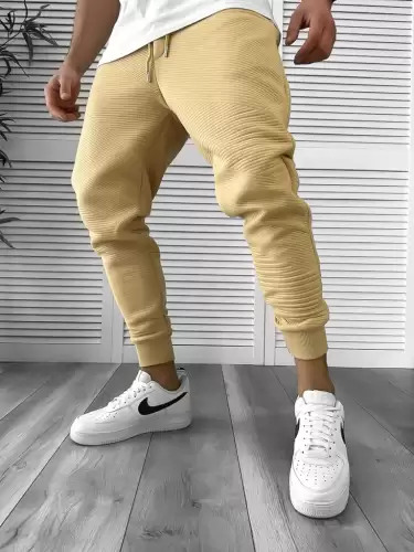 Pantaloni de trening bej conici k041 55-4