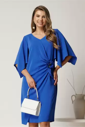 Rochie midi albastra din voal cu floare si volan in talie