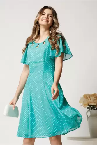 Rochie midi verde mint din voal in clin cu buline si decupaje la decolteu